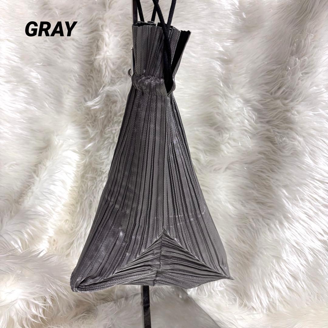 プリーツプリーズイッセイミヤケ 巾着ポーチ リバーシブル グレー ブラック