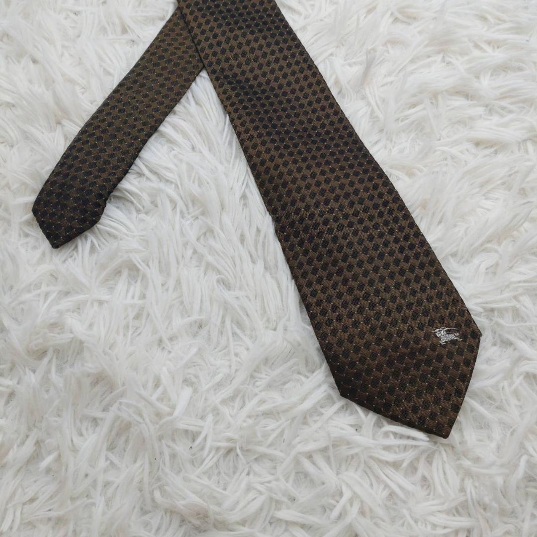 バーバリー 高級シルクネクタイ 総柄（ホースロゴ） ダークブラウン