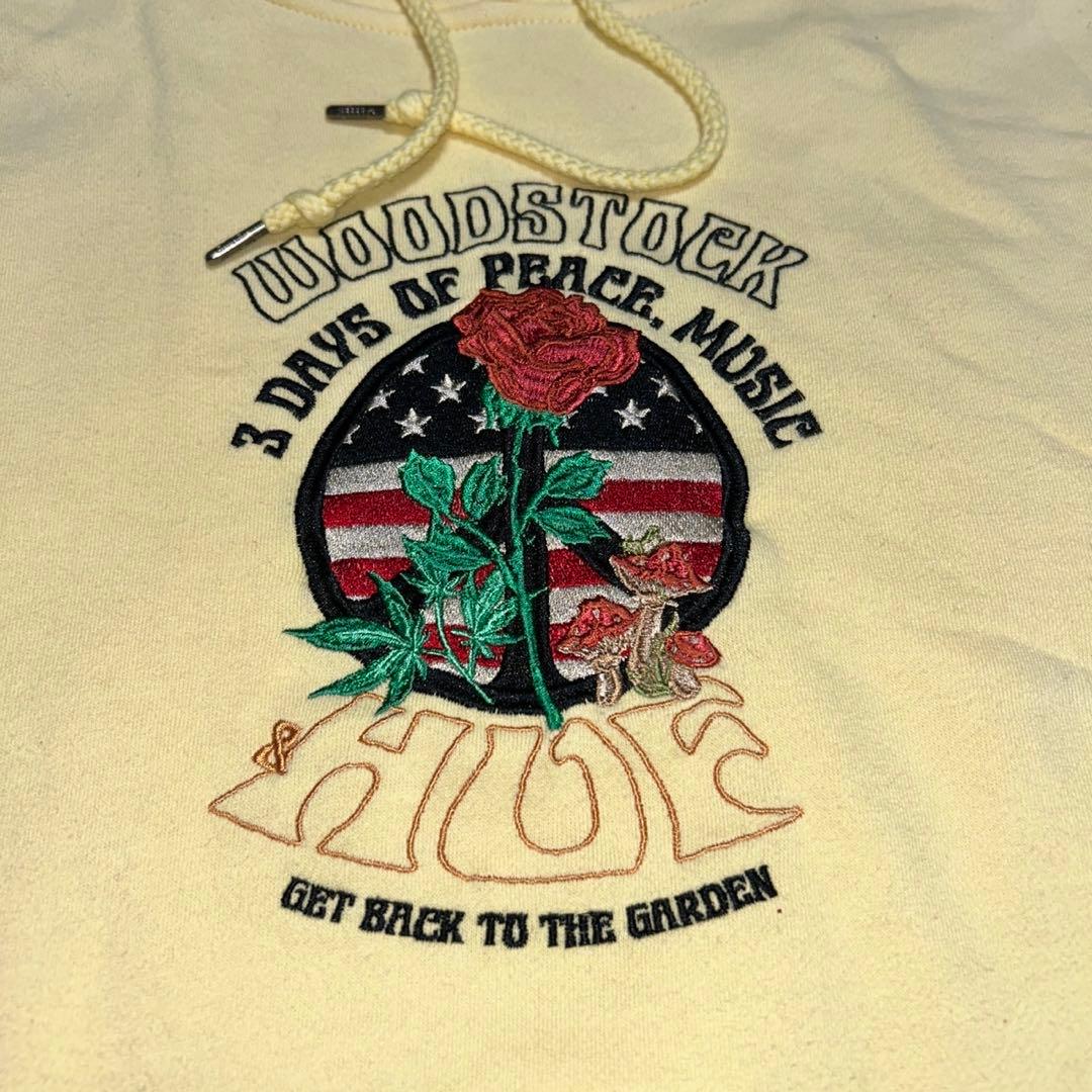 レアHUF×WOODSTOCKハフ×ウッドストック プルオーバーフーディー