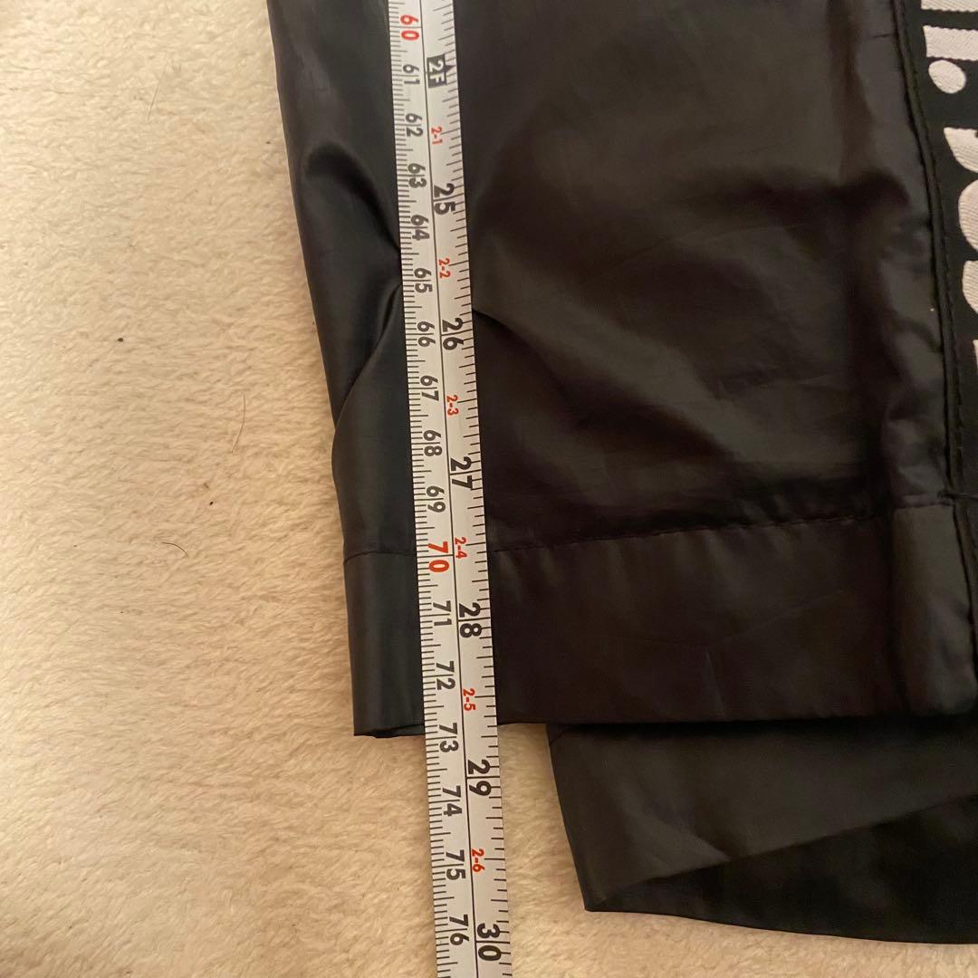 Nike レディースナイロンジャケットセットアップ XL 黒/蛍光イエロー