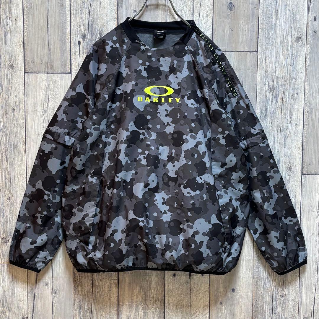 オークリー　OAKLEY ナイロン　プルオーバー　ジャケット　ハーフジップ　総柄