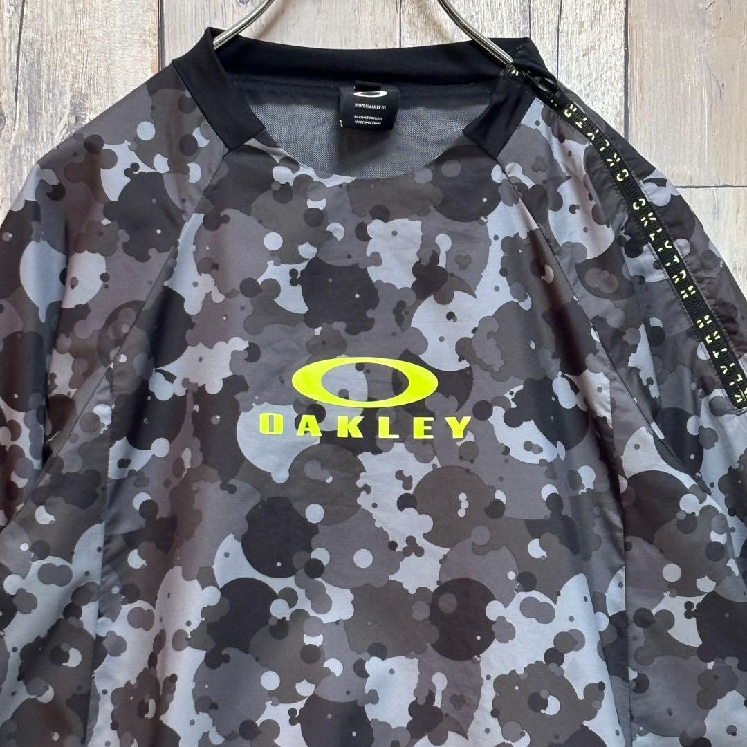 オークリー　OAKLEY ナイロン　プルオーバー　ジャケット　ハーフジップ　総柄