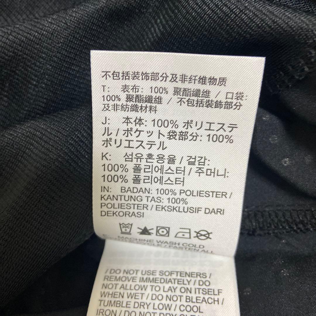 新品！ナイキNIKE ジャンパー 黒 ルーズ フィット　ランニング 反射