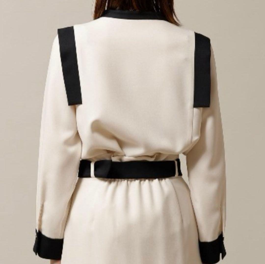 TONAL バイカラーツイルハイネックピンタックブラウス