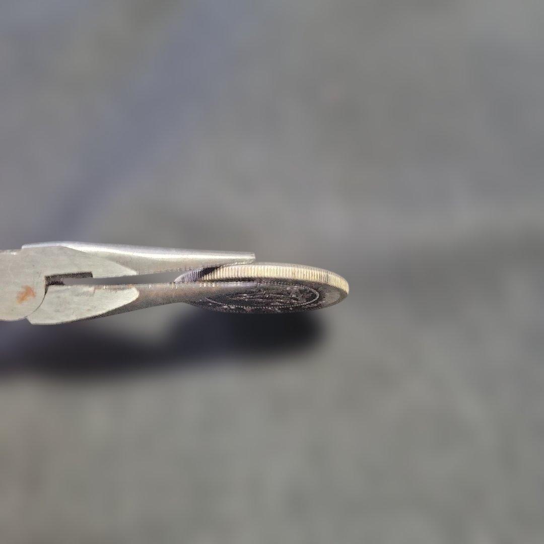 黒糖です。　一円銀貨 　明治34年