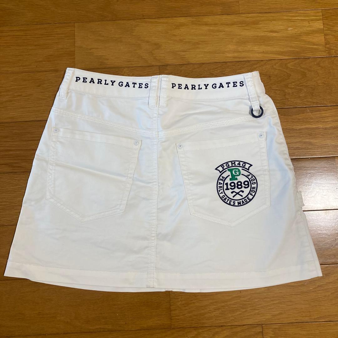 PG パーリーゲイツ　ピンクポロシャツとホワイトスカートセット