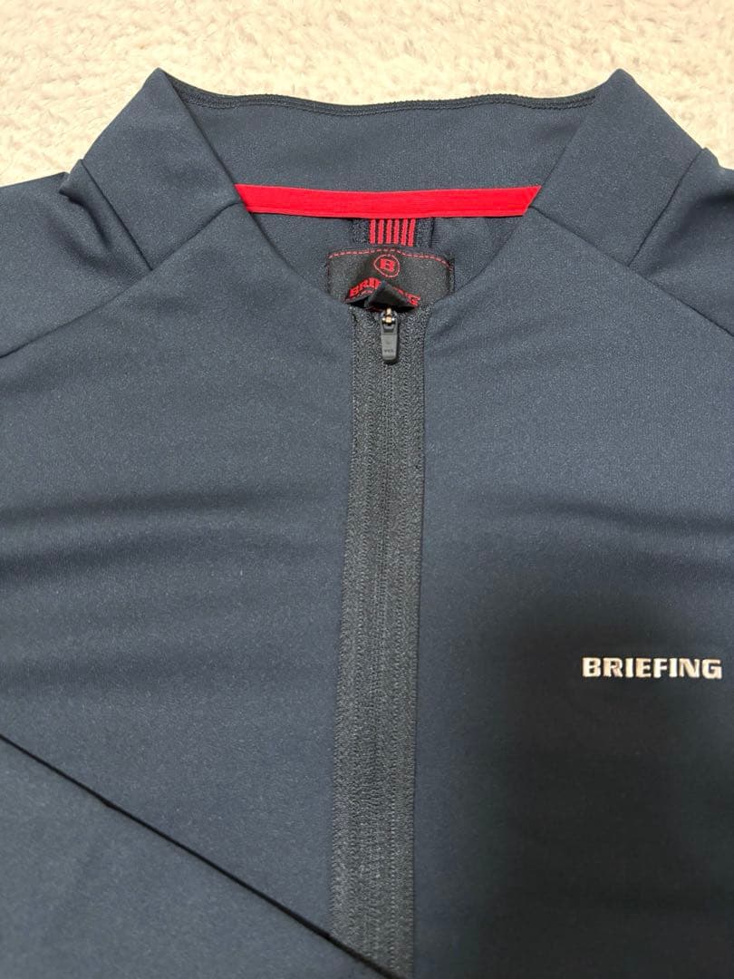 と*る様 ブリーフィング ハーフジップ トップス