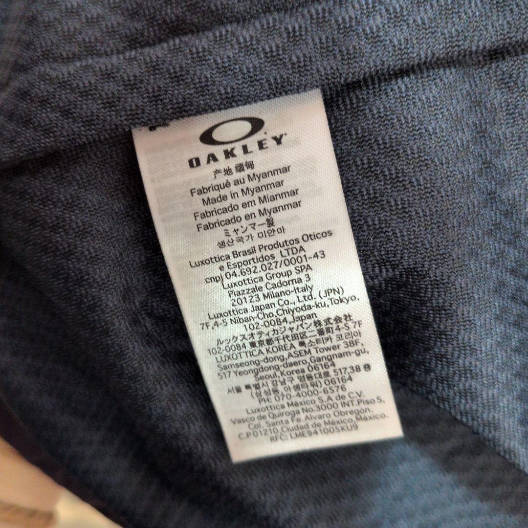 新品タグ付オークリー　ゴルフ　ウィンドブレーカー　XL パープル