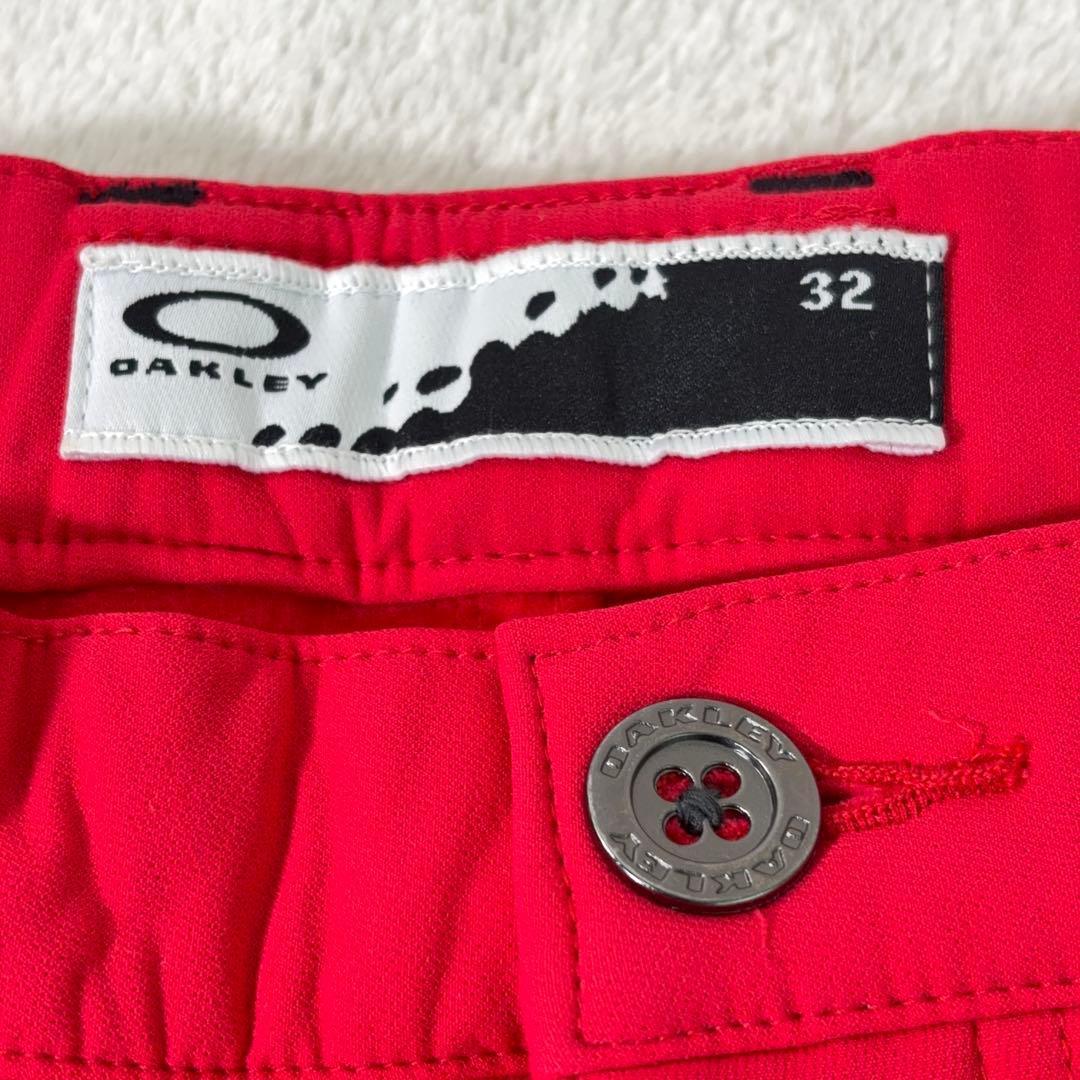 タグ付美品【OAKLEY】ゴルフパンツ 撥水 防寒 裏起毛 ロゴ刺繍 赤系 32
