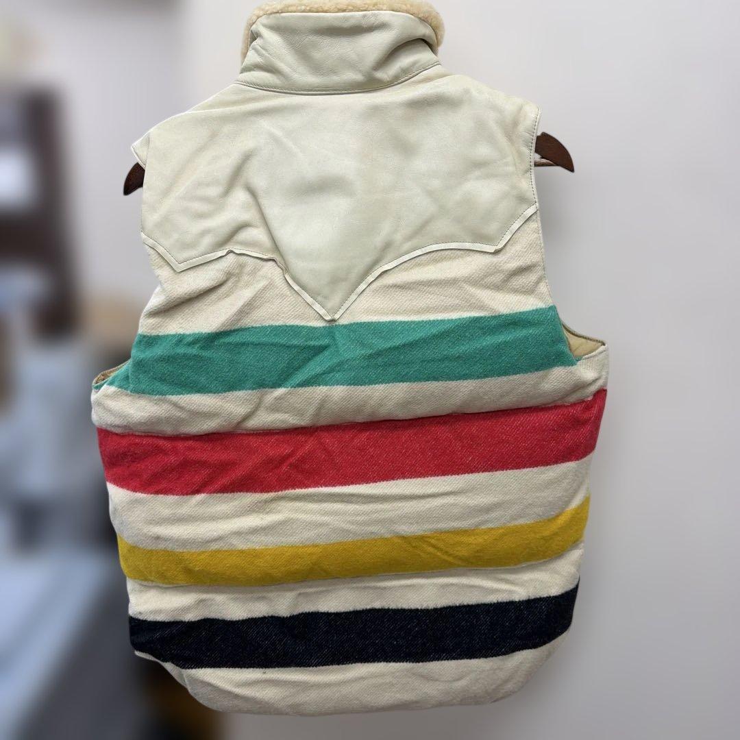 t*a様 未使用品タグ付自宅保管ロッキーマウンテン限定ダウンベスト40サイズ