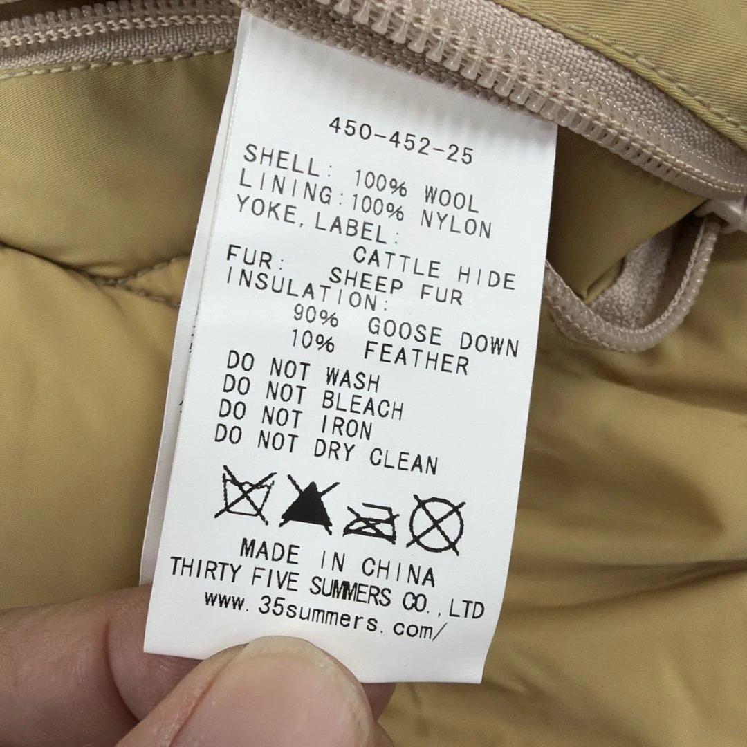 t*a様 未使用品タグ付自宅保管ロッキーマウンテン限定ダウンベスト40サイズ