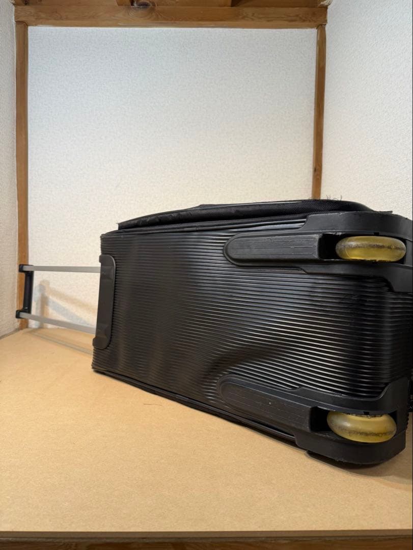 本間ゴルフ（HONMA GOLF）黒いボストンバッグ　キャリー付き