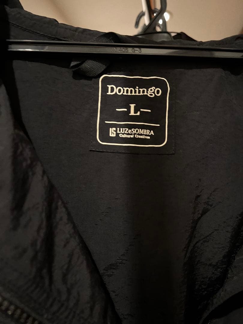 DOMINGO フード付きプルオーバー ブラック　Ｌサイズ