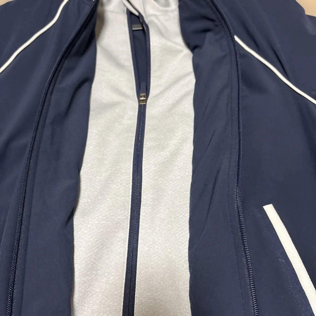 LACOSTE ゴルフ シーズナルズストレッチジップアップジャケット ネイビー