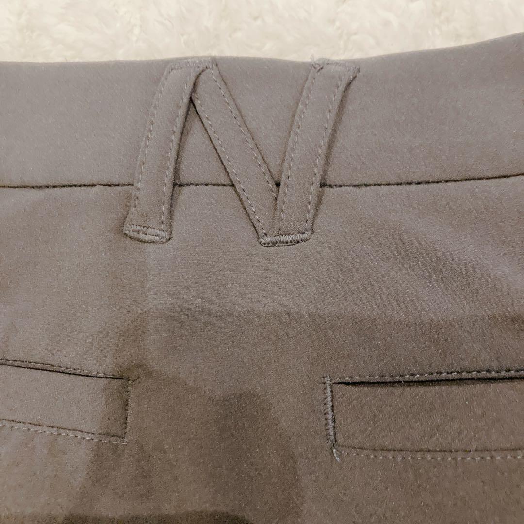 【美品】ニューバランス ストレッチ プリーツ スカート 台形 ブラック 黒 ロゴ