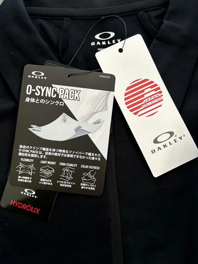 新品 OAKLEY オークリー 長袖ハーフジッププルオーバー UPF50速乾 L