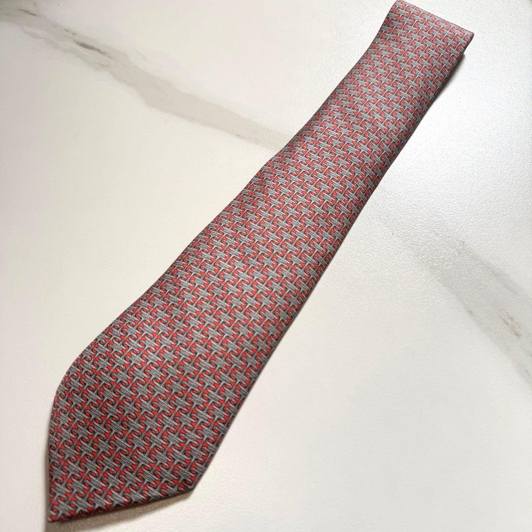 【正規品】未使用品HERMES エルメス　ネクタイ　朱色シルバー色