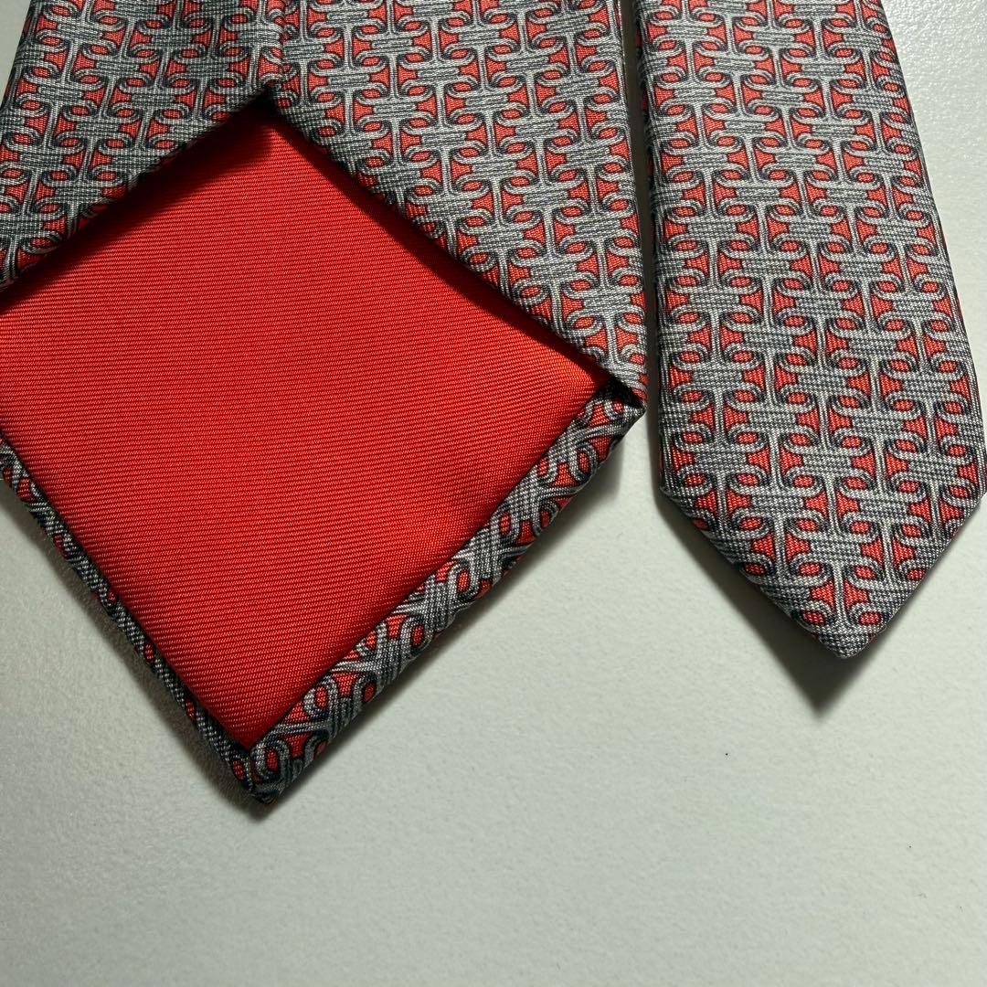 【正規品】未使用品HERMES エルメス　ネクタイ　朱色シルバー色