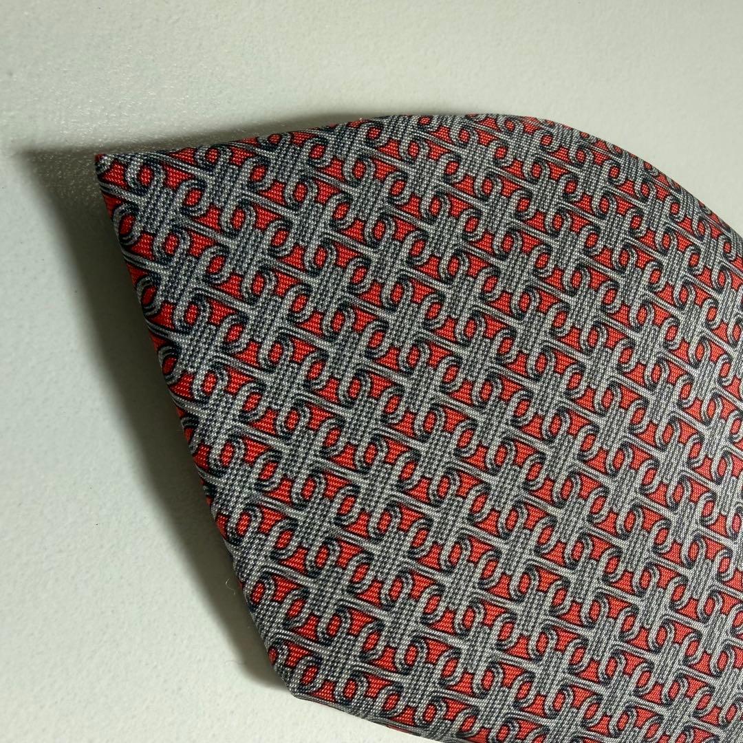 【正規品】未使用品HERMES エルメス　ネクタイ　朱色シルバー色