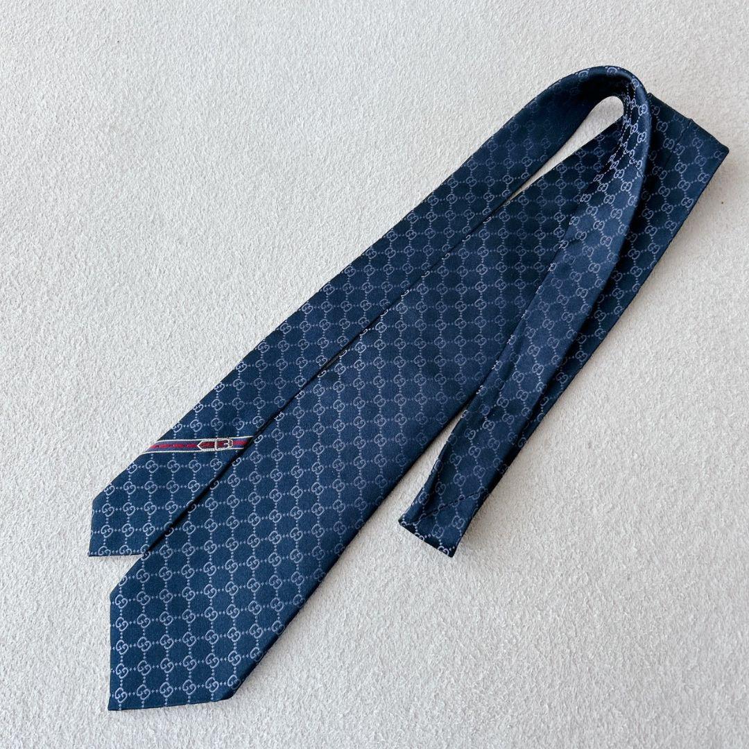 【グッチ】ネクタイ　GG柄　ロゴ総柄 シルク100% ネイビー　現行タグ