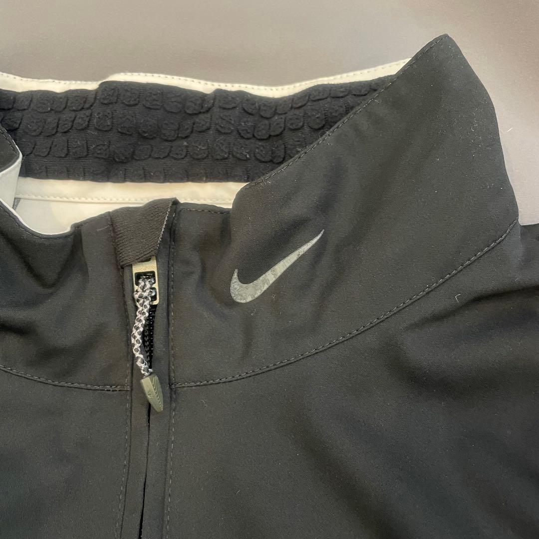 NIKE GOLF ナイキゴルフSTORM-FIT ハーフジップ ナイロンジャケ