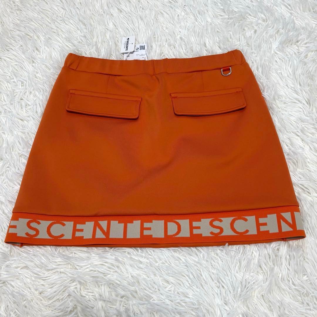 新品未使用★DESCENTEレディース ゴルフ オレンジ　上下セット