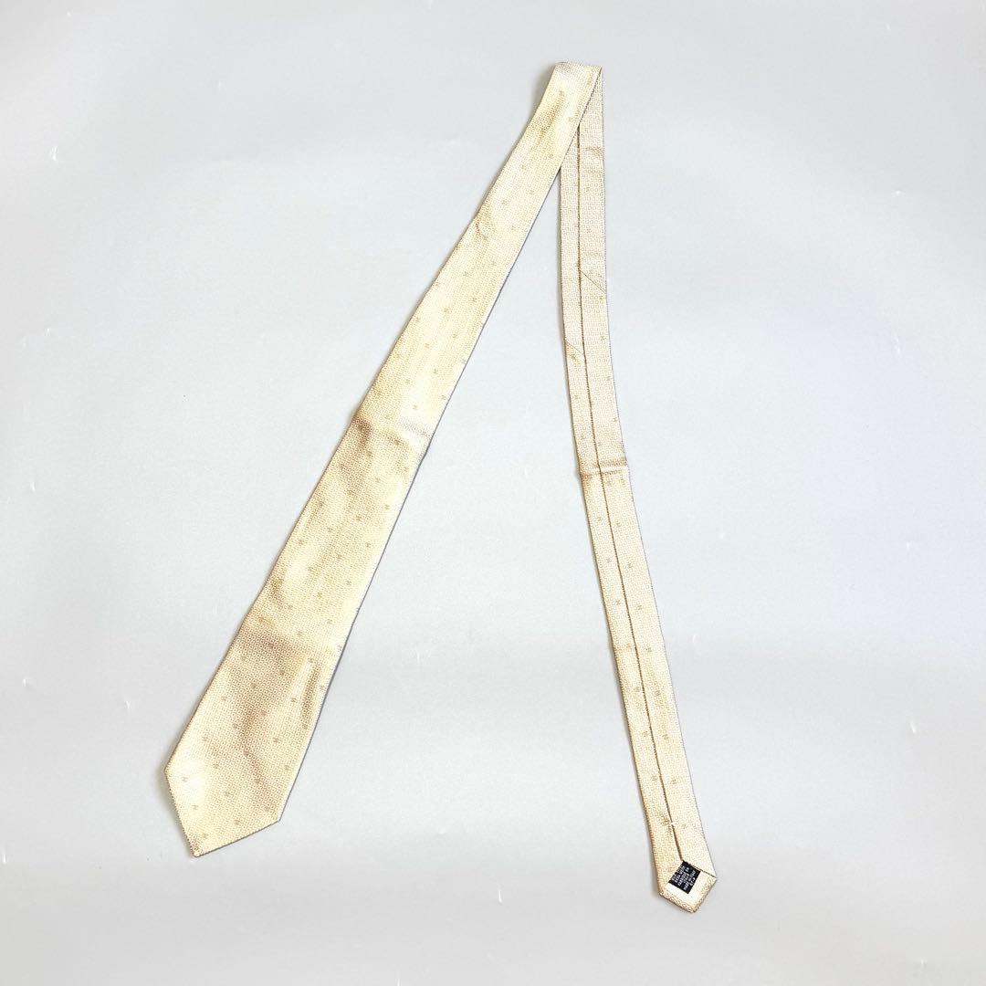 CHANEL ネクタイ シルク100% ココマーク総柄 ゴールド系　チェーン付