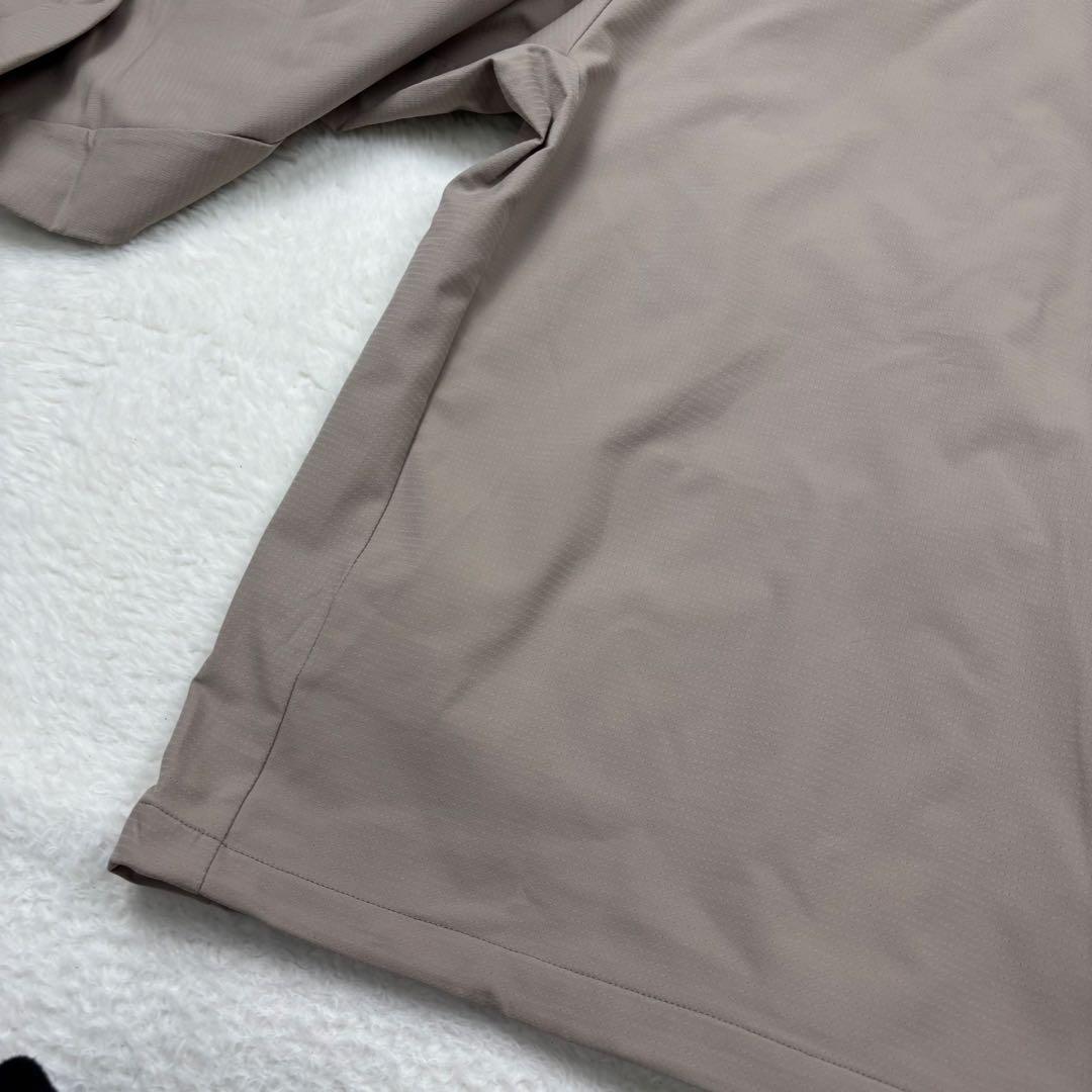 未使用級　new balance ゴルフジャケット 薄て　ベージュ　春ゴルフ