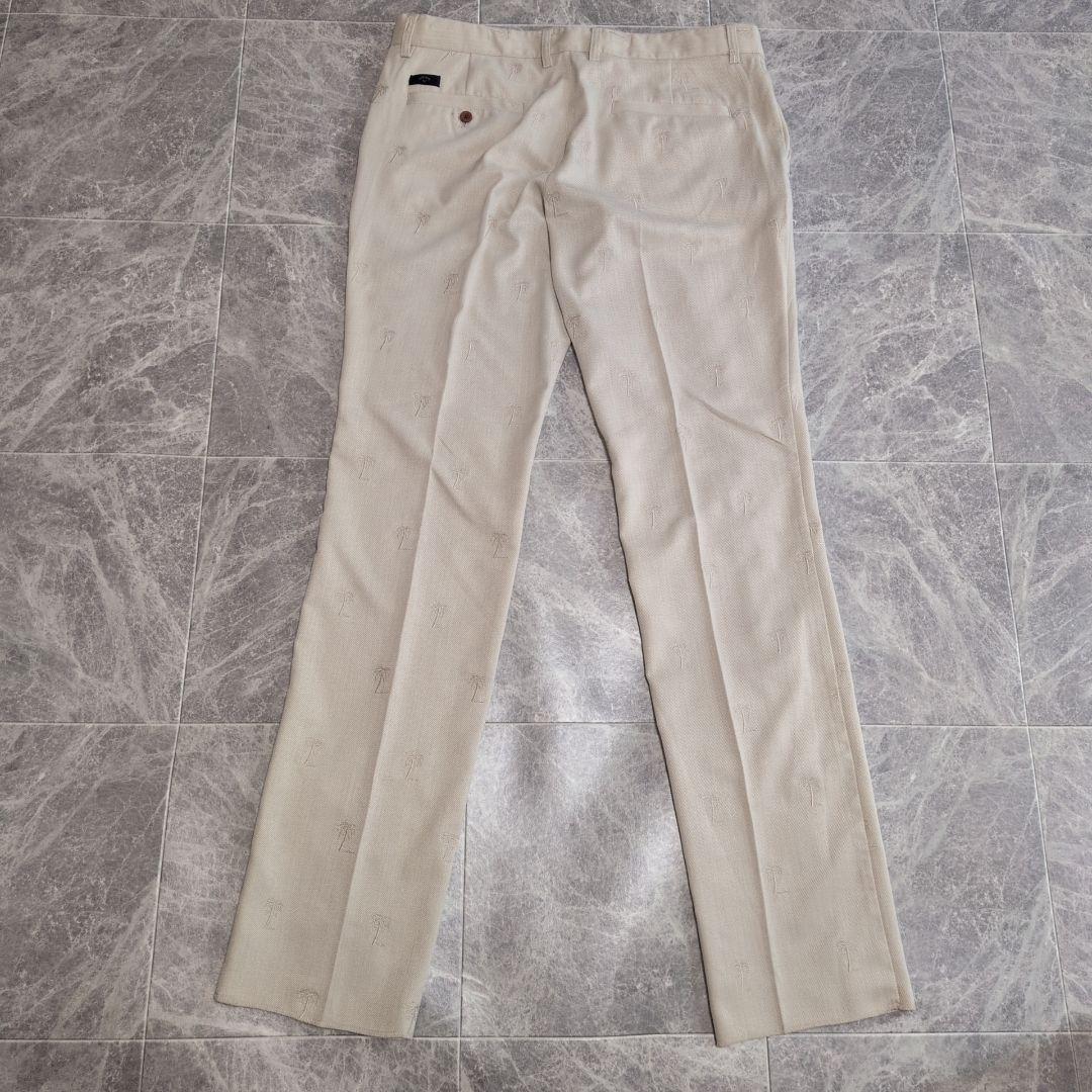 【未使用タグ付】キャロウェイ XL ゴルフパンツ 総柄 ヤシの木 刺繍