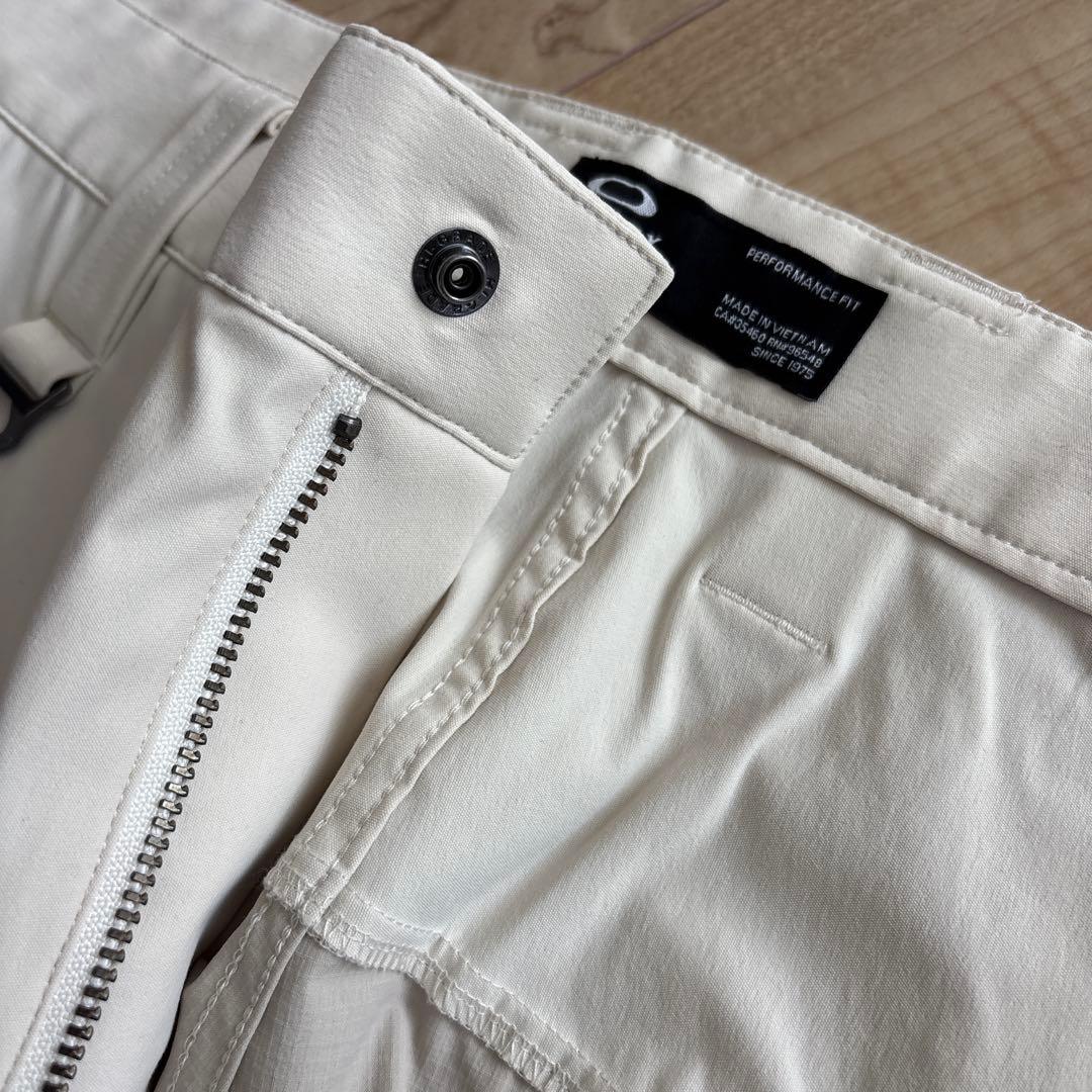 新品　オークリー　メンズ　ゴルフ　ストレッチ　ゆったり　通年用　撥水　防風　36