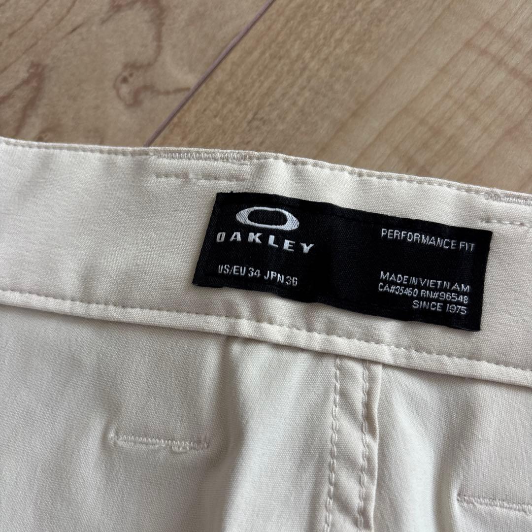 新品　オークリー　メンズ　ゴルフ　ストレッチ　ゆったり　通年用　撥水　防風　36