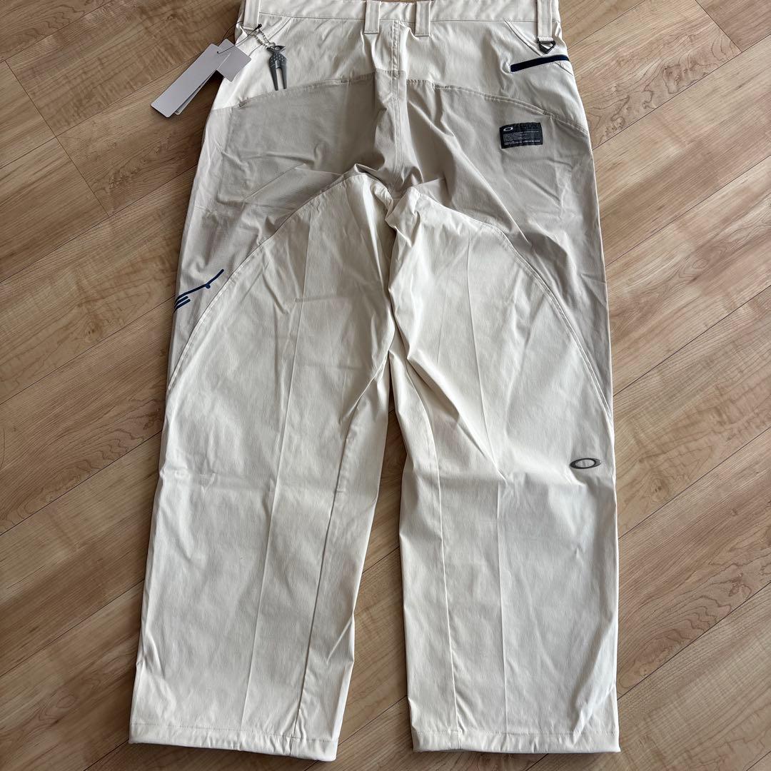 新品　オークリー　メンズ　ゴルフ　ストレッチ　ゆったり　通年用　撥水　防風　36
