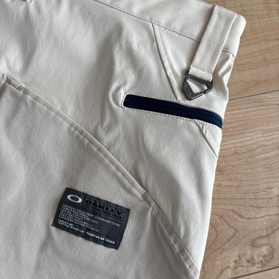 新品　オークリー　メンズ　ゴルフ　ストレッチ　ゆったり　通年用　撥水　防風　36