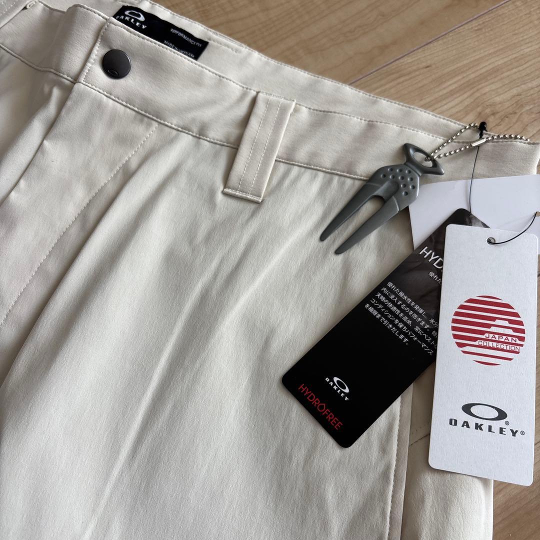 新品　オークリー　メンズ　ゴルフ　ストレッチ　ゆったり　通年用　撥水　防風　36