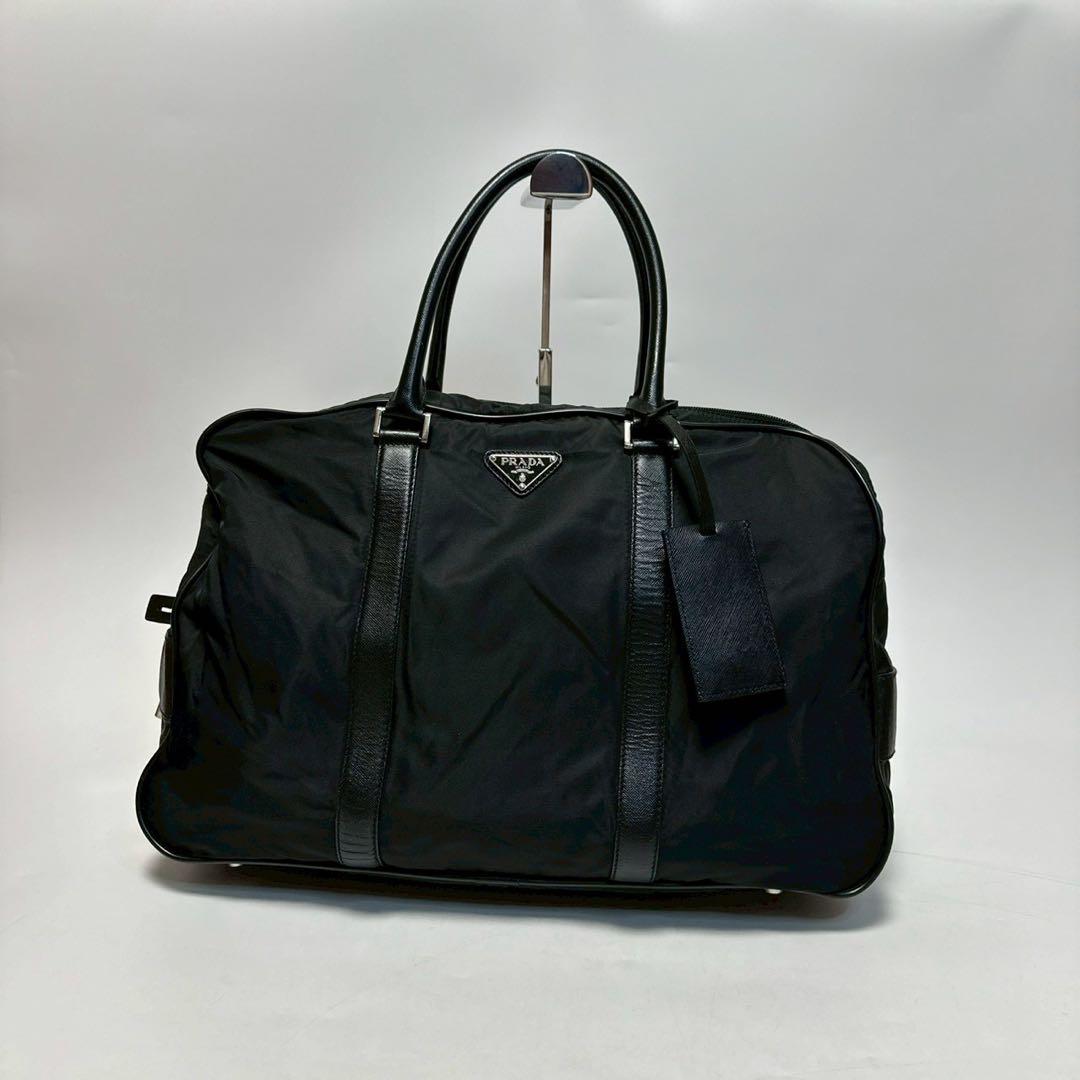u35【近年モデル】保存袋付　プラダ　サフィアーノ　黒　南京錠　ハンドバッグ.