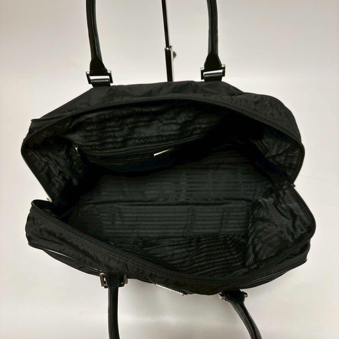 u35【近年モデル】保存袋付　プラダ　サフィアーノ　黒　南京錠　ハンドバッグ.