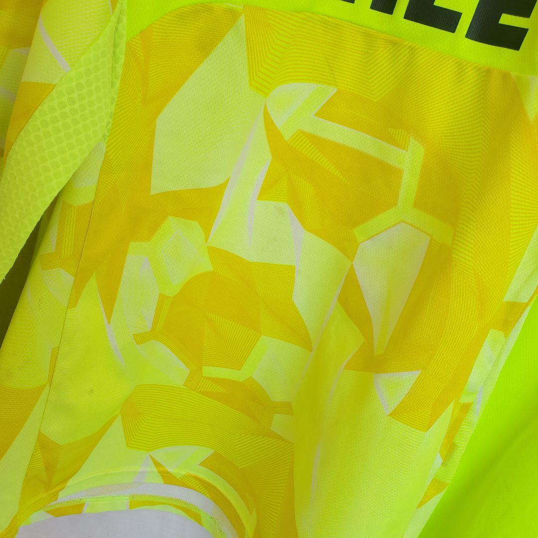 ATHLETA ネオンイエロー 長袖 ウェア ロンT 模様 柄 サッカー