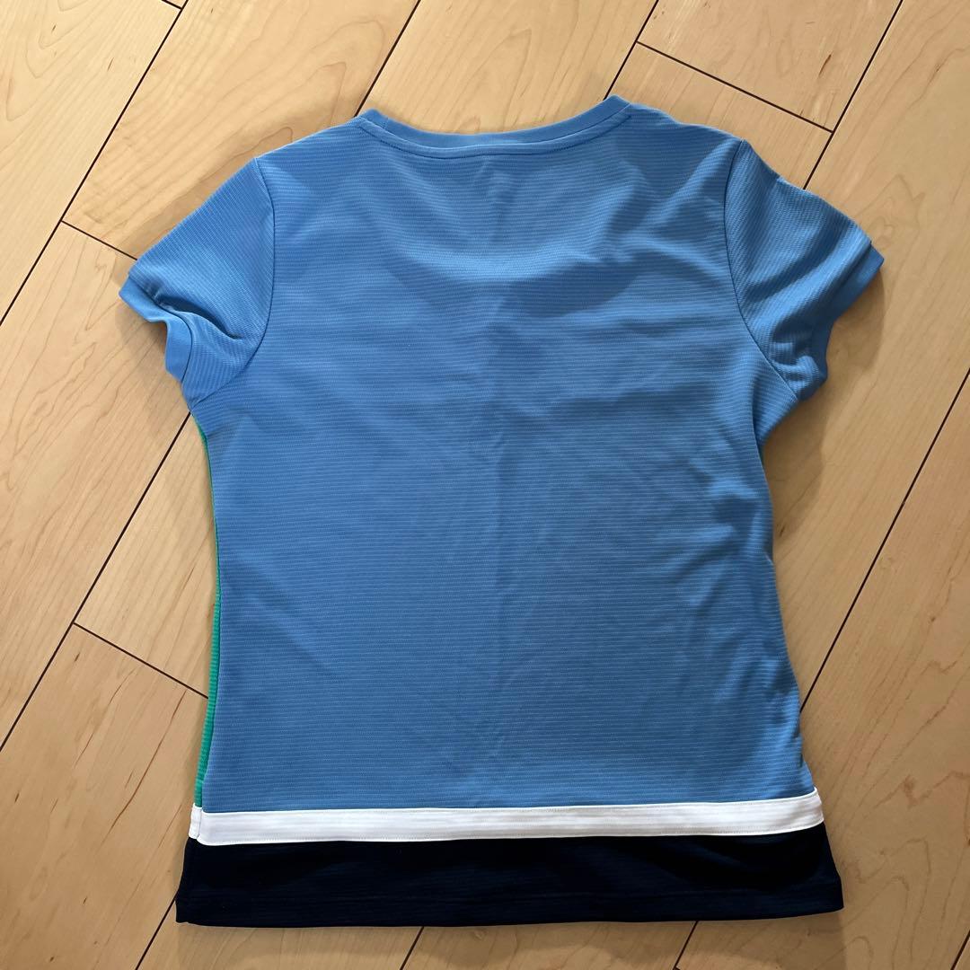 FＩＬＡのブルーシャツとオレンジセットアップです