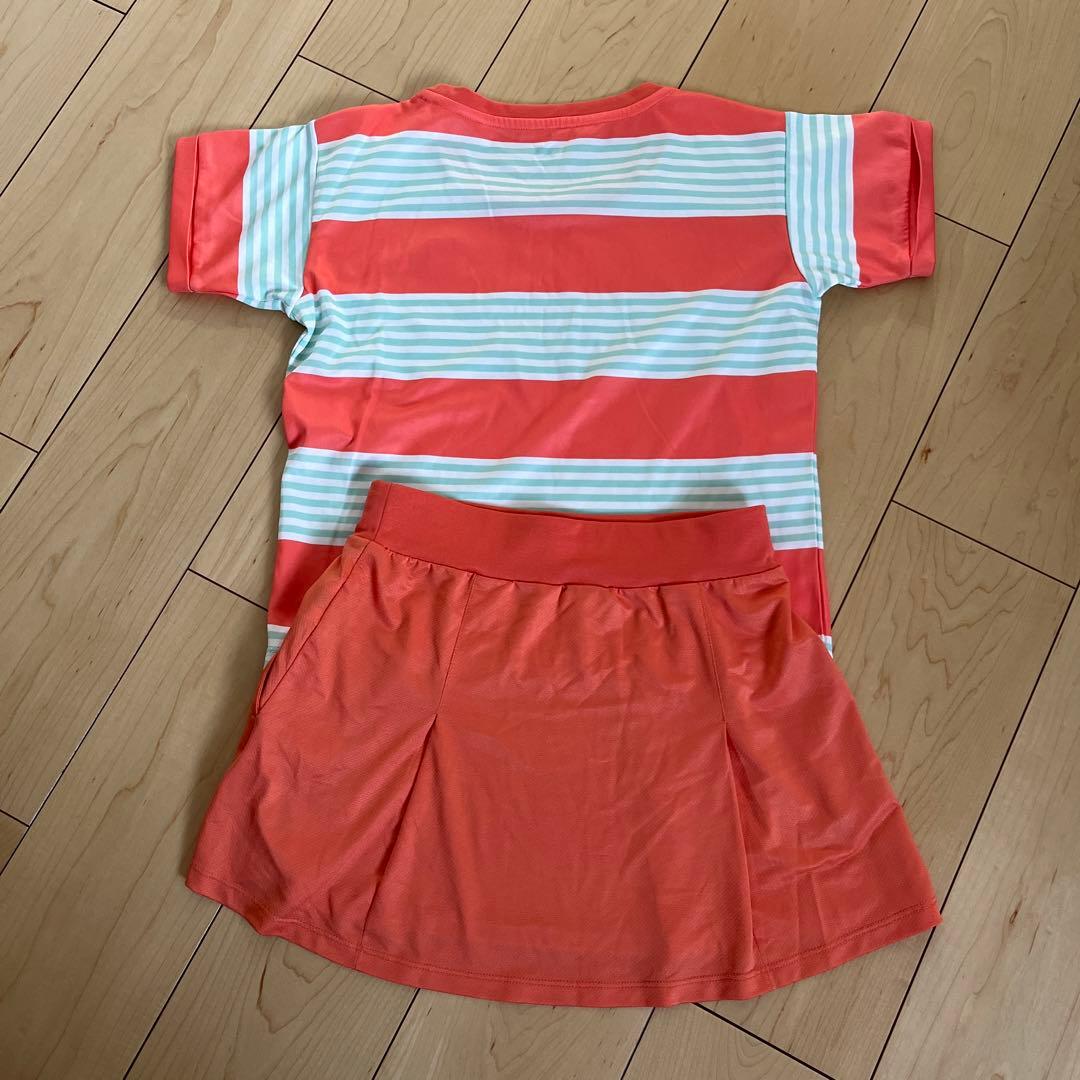 FＩＬＡのブルーシャツとオレンジセットアップです