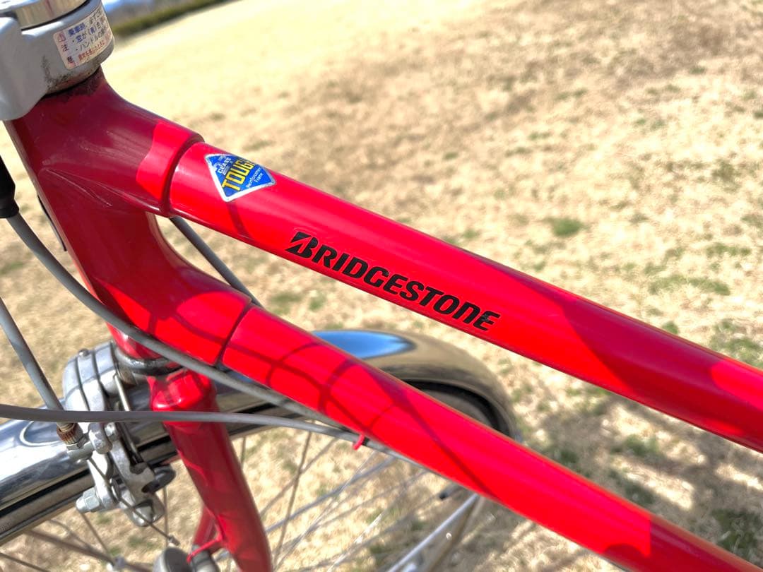 BRIDGESTONE シティサイクル 赤 前カゴ付き　27インチ