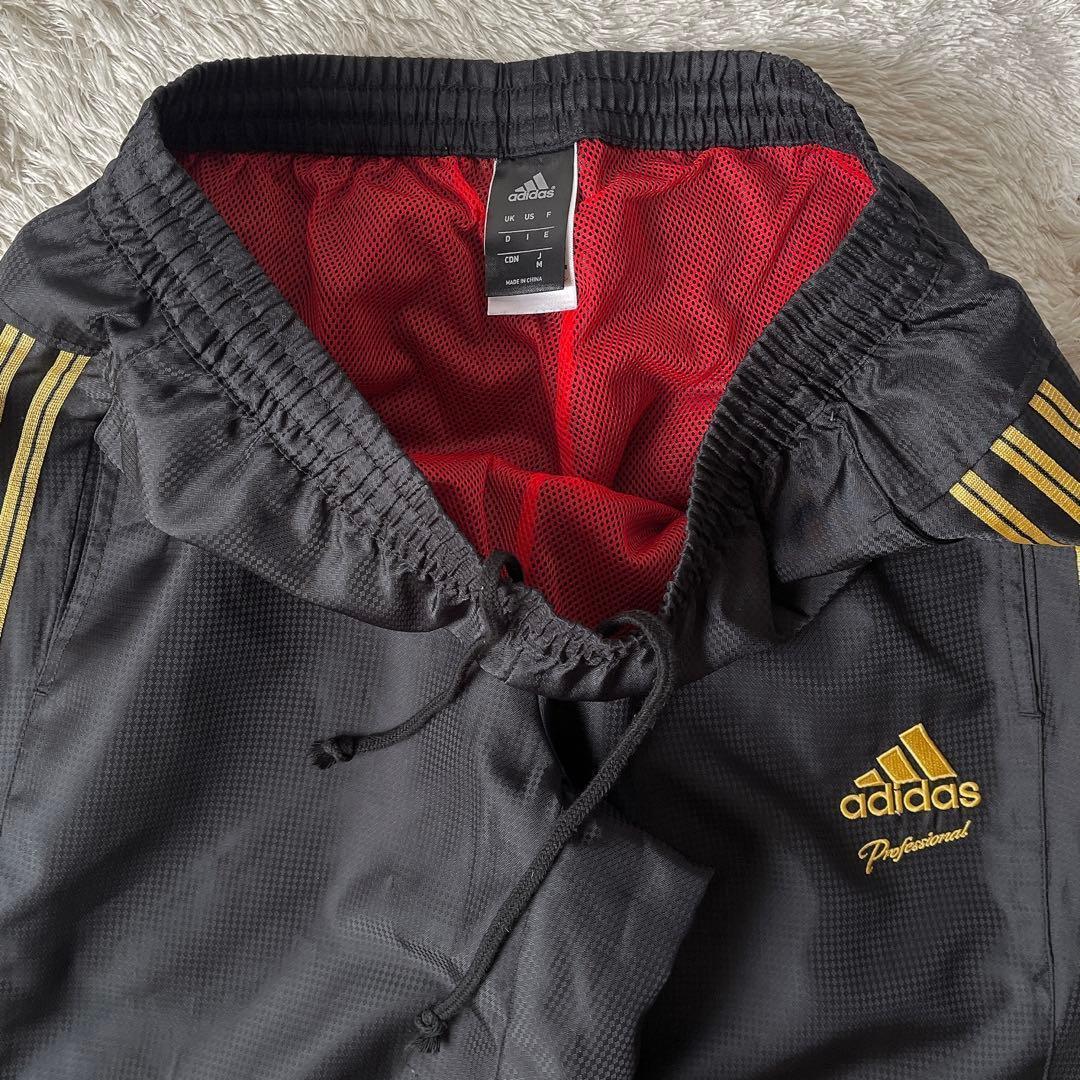 【美品】アディダス ナイロン 上下セットアップ ウィンドブレーカー ロゴ刺繍 黒