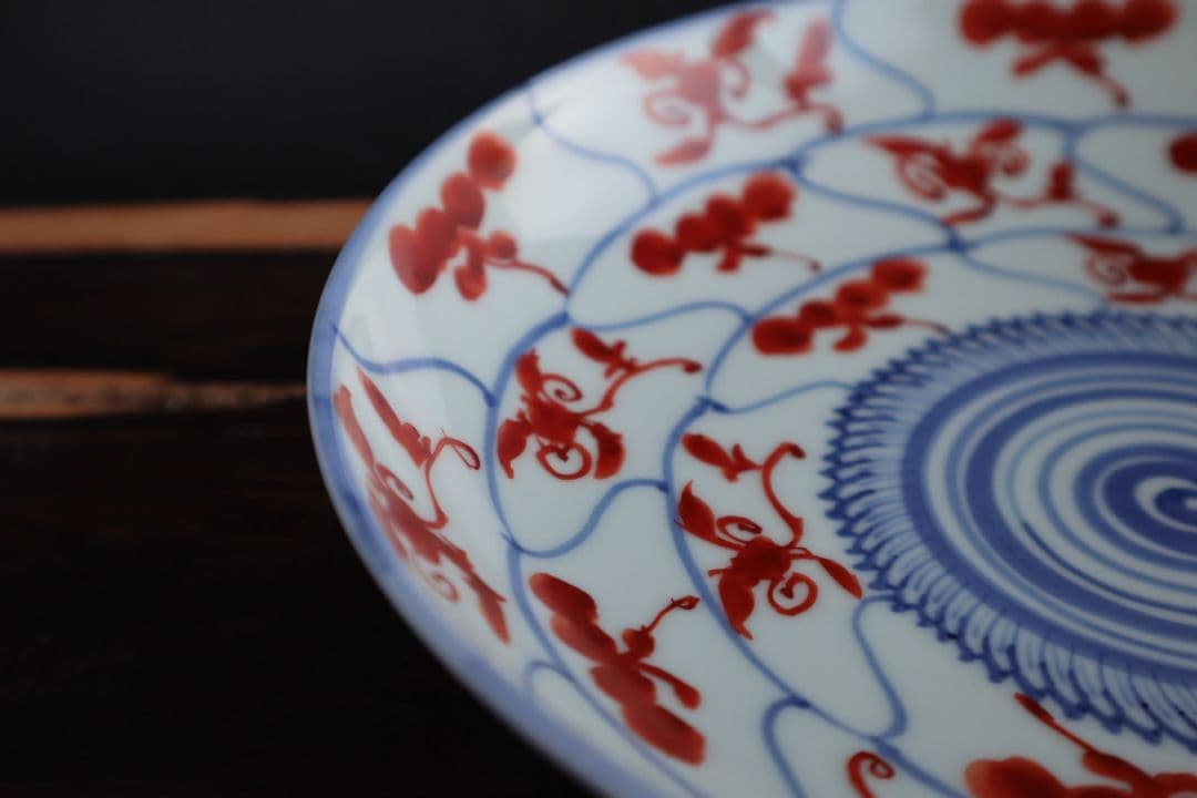 赤絵草花霊芝文七寸皿