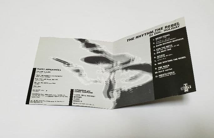 DJ DOC. HOLIDAY / The Rhythm. The Rebel