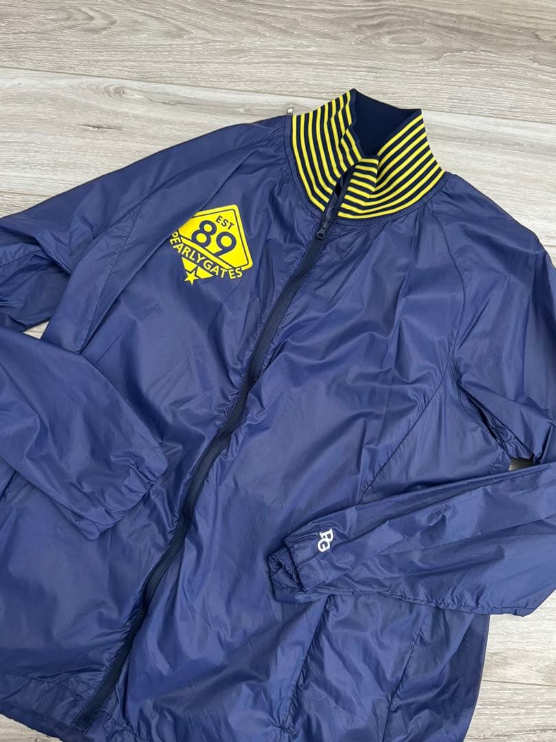 パーリーゲイツ ツインスニード 保温/防寒 メンズ ブルゾン 黄 紺　サイズ5