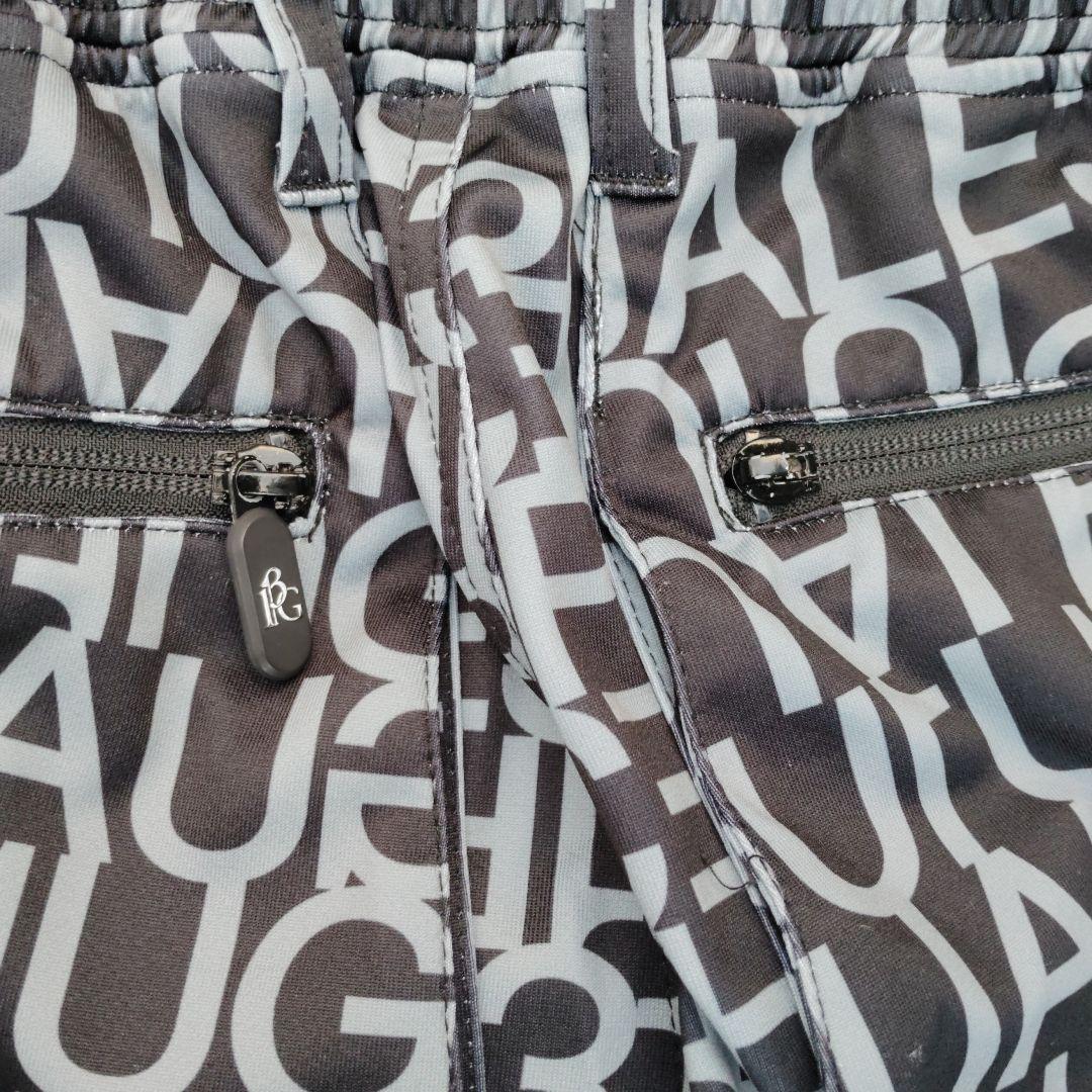 1PIU1UGUALE3 GOLF　ロゴ総柄ゴルフパンツ　ジョガーパンツ