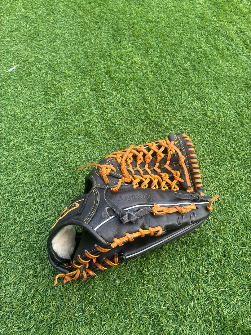 軟式外野手用グローブ 黒/オレンジ 久保田スラッガー