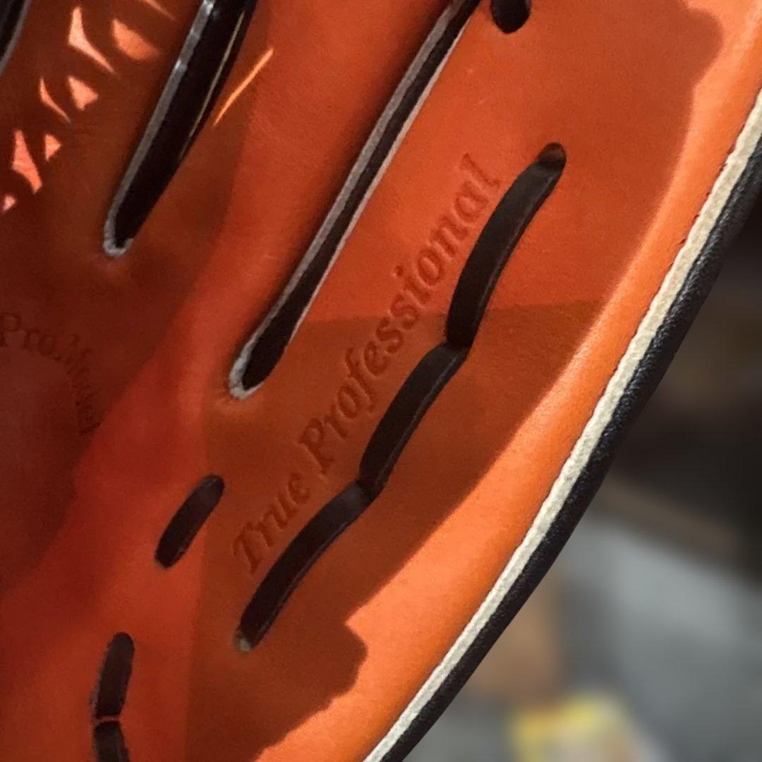 スラッガー　軟式グローブ 黒/オレンジ　湯揉み済み　新品