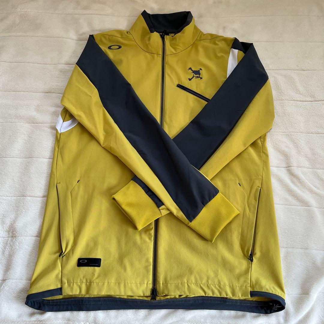 オークリー ゴルフウェア 長袖ウインドブレーカー サイズＬ 黄色 日本正規品