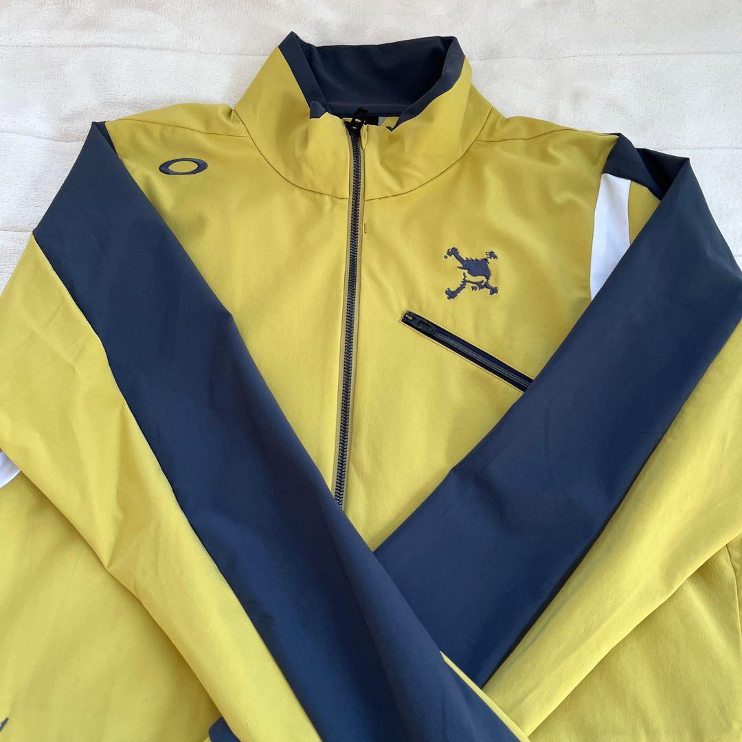 オークリー ゴルフウェア 長袖ウインドブレーカー サイズＬ 黄色 日本正規品