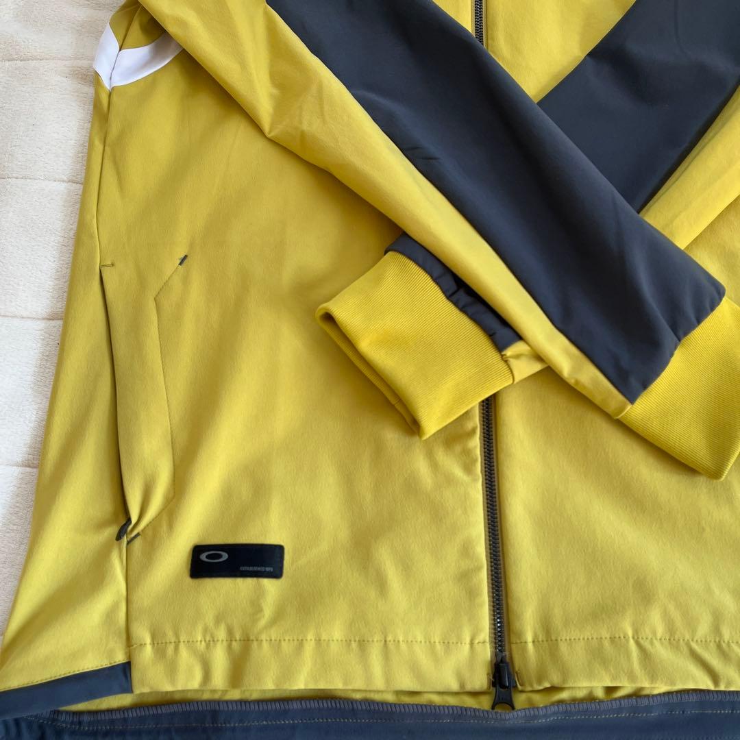 オークリー ゴルフウェア 長袖ウインドブレーカー サイズＬ 黄色 日本正規品